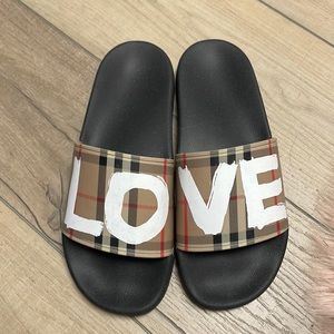 Women’s size 11 Burberry Slides.  Only worn 3 times.